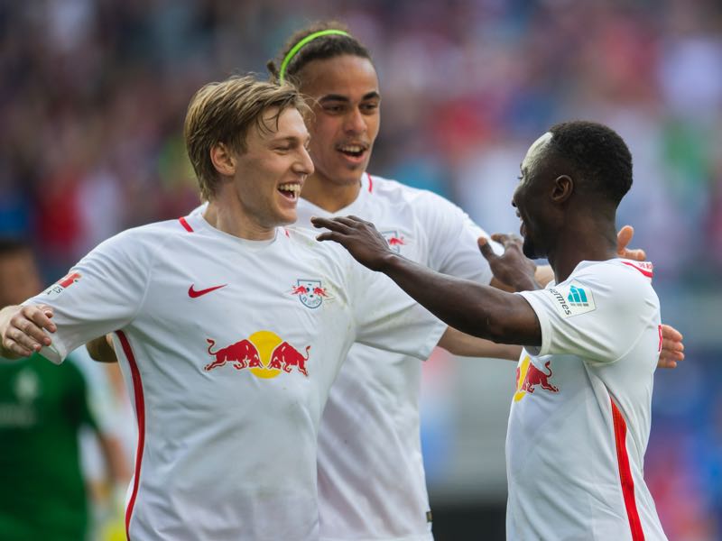 Leipzig's management have already told stars Forsberg (l), Poulson (c) and Keïta (r) that they will not be allowed to leave the club. (ROBERT MICHAEL/AFP/Getty Images)