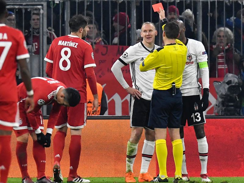 Besiktas defender Domagoj Vida was rightfully sent off in the first half. (THOMAS KIENZLE/AFP/Getty Images)