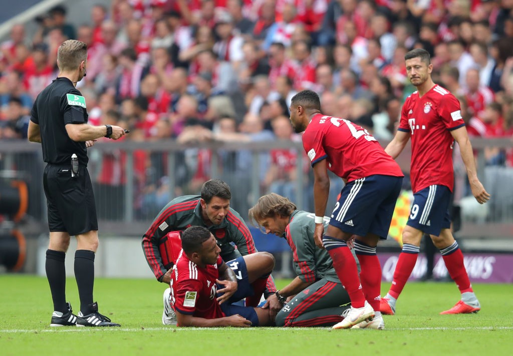 Corentin Tolisso goes down injured during the Bundesliga match Bayern vs Bayer