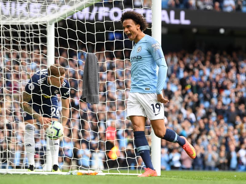 Leroy Sane of Manchester City celebrates after scoring his team's first goal during the Premier League match between Manchester City and Fulham FC at Etihad Stadium on September 15, 2018 in Manchester, United Kingdom. (Photo by Michael Regan/Getty Images)