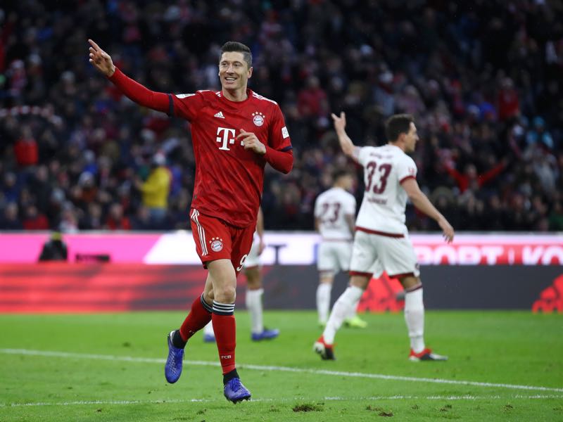 Bayern v Nürnberg - Robert Lewandowski of Bayern Munich celebrates after scoring his team's second goal during the Bundesliga match between FC Bayern Muenchen and 1. FC Nuernberg at Allianz Arena on December 8, 2018 in Munich, Germany. (Photo by Alex Grimm/Bongarts/Getty Images)