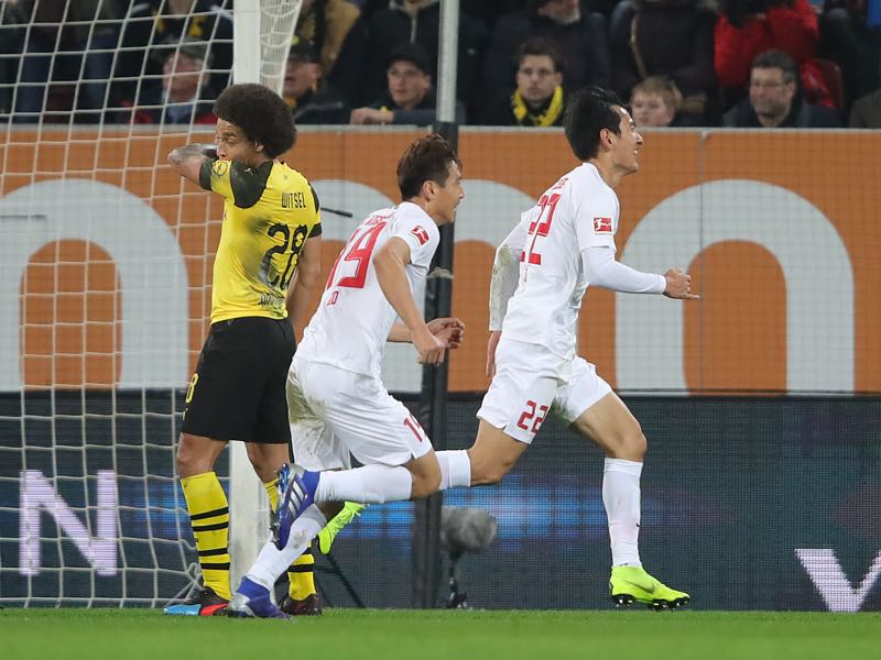 Augsburg v Dortmund - Ji Dong-Won of Augsburg celebrates scoring his teams first goal during the Bundesliga match between FC Augsburg and Borussia Dortmund at WWK-Arena on March 01, 2019 in Augsburg, Germany. (Photo by Alexander Hassenstein/Bongarts/Getty Images)