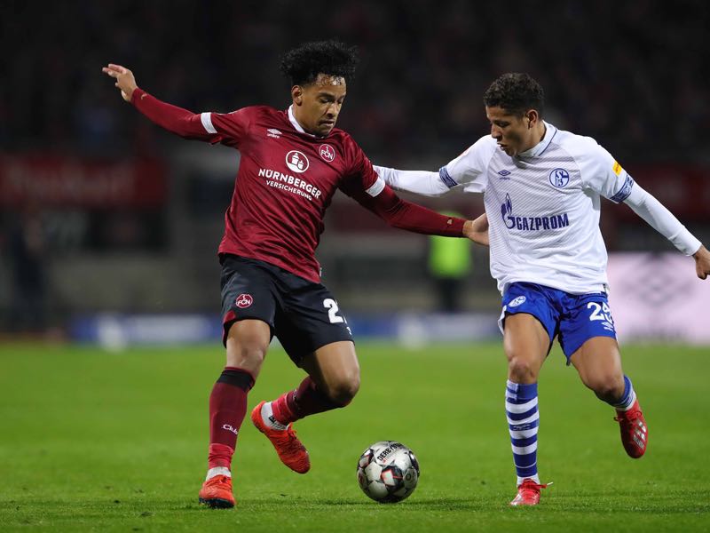 Nürnberg v Schalke -Matheus Pereira of FC Nuernberg competes for the ball with Amine Harit of FC Schalke 04during the Bundesliga match between 1. FC Nuernberg and FC Schalke 04 at Max-Morlock-Stadion on April 12, 2019 in Nuremberg, Germany. (Photo by Alexander Hassenstein/Bongarts/Getty Images)