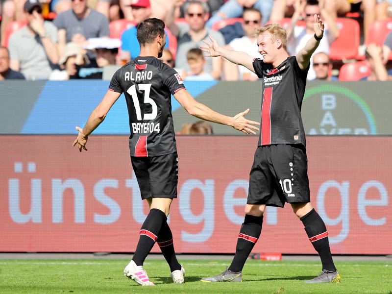 Bayer Leverkusen v Nürnberg - Lucas Alario of Bayer 04 Leverkusen celebrates after scoring his team's first goal with teammate Julian Brandt during the Bundesliga match between Bayer 04 Leverkusen and 1. FC Nuernberg at BayArena on April 20, 2019 in Leverkusen, Germany. (Photo by Christof Koepsel/Bongarts/Getty Images)