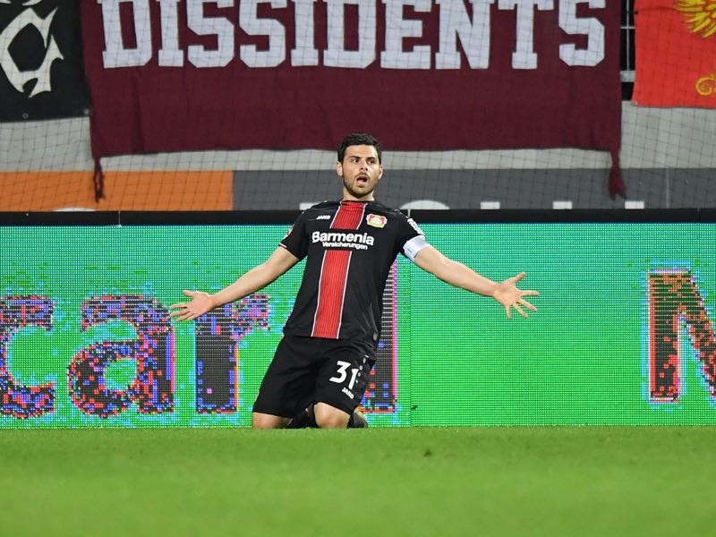 Augsburg v Leverkusen - Kevin Volland of Bayer 04 Leverkusen celebrates after scoring his team's first goal during the Bundesliga match between FC Augsburg and Bayer 04 Leverkusen at WWK-Arena on April 26, 2019 in Augsburg, Germany. (Photo by Sebastian Widmann/Bongarts/Getty Images)