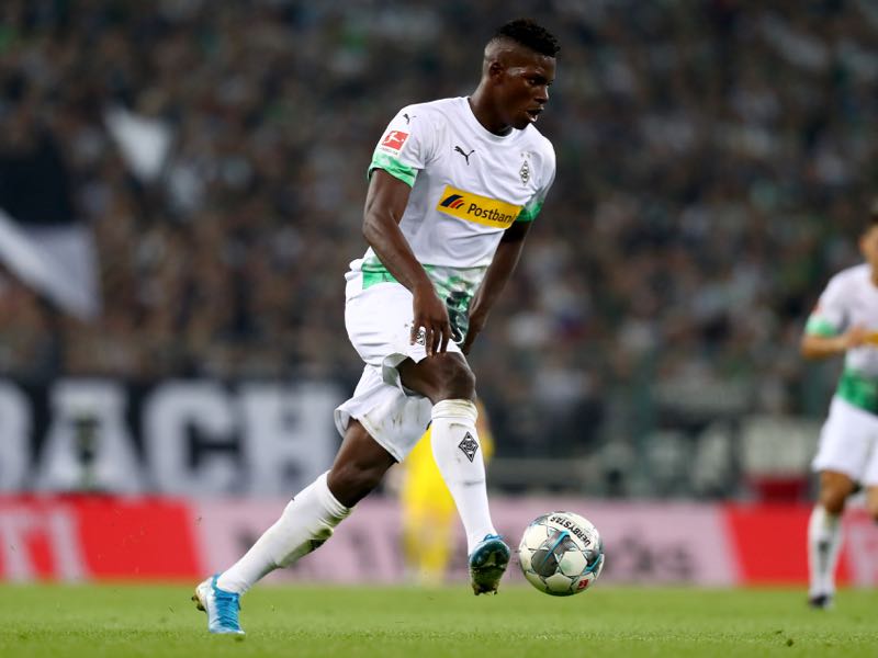 Breel Embolo of Moenchengladbach runs with the ball during the Bundesliga match between Borussia Moenchengladbach and RB Leipzig at Borussia-Park on August 30, 2019 in Moenchengladbach, Germany. (Photo by Lars Baron/Bongarts/Getty Images)