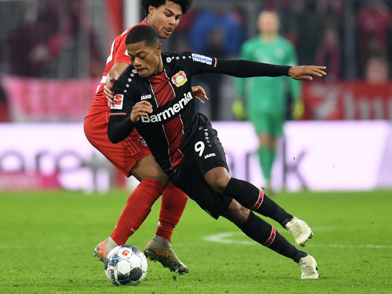 Bayern Munich v Leverkusen - Bayern Munich's midfielder Serge Gnabry (R) and Leverkusen's Brazil striker Leon Bailey (L) vie for the ball during the German first division Bundesliga football match FC Bayern Munich vs Bayer 04 Leverkusen in Munich, southern Germany, on November 30, 2019. (Photo by Christof STACHE / AFP)