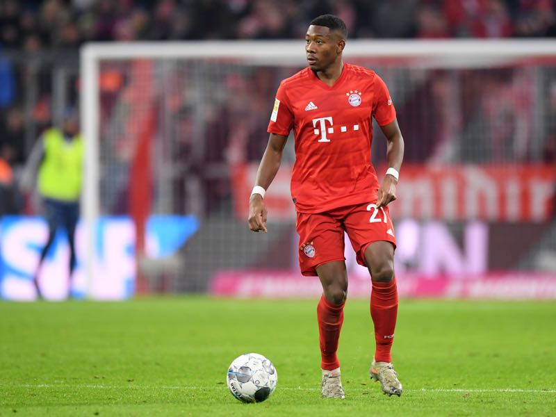 David Alaba of Bayern Muenchen plays the ball during the Bundesliga match between FC Bayern Muenchen and Bayer 04 Leverkusen at Allianz Arena on November 30, 2019 in Munich, Germany. (Photo by Sebastian Widmann/Bongarts/Getty Images)